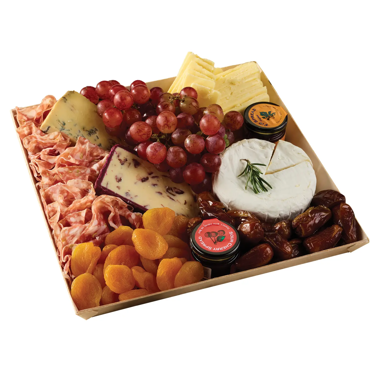 A generous gourmet cheese and charcuterie platter with grapes, cured meats, dried apricots, dates, chutney, and assorted cheeses; inviting and festive.