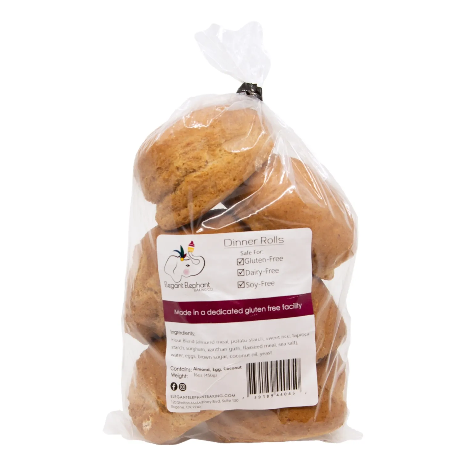 A clear bag of Elegant Elephant golden-brown gluten-free dinner rolls.