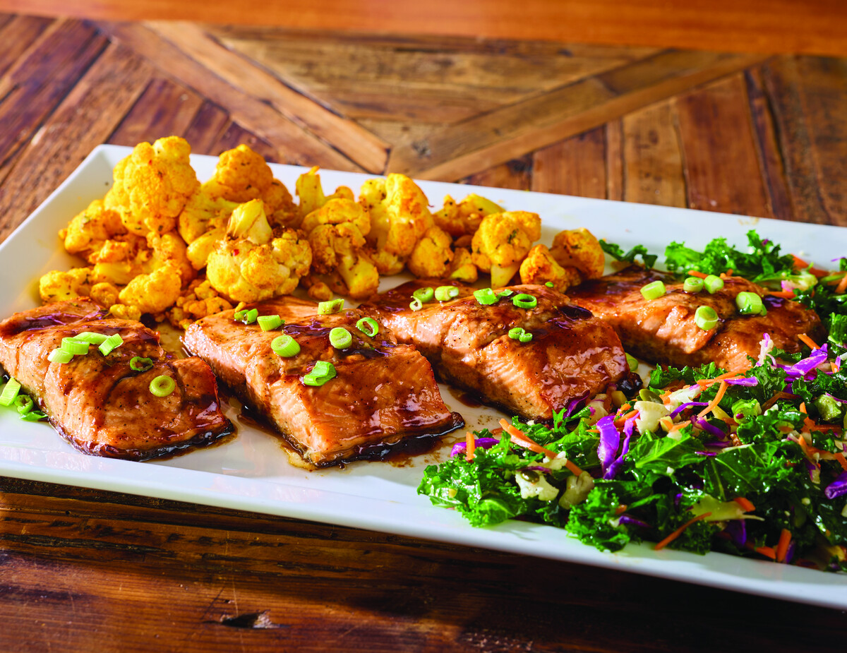 Honey balsamic glazed steelhead fillets with roasted cauliflower and kale salad